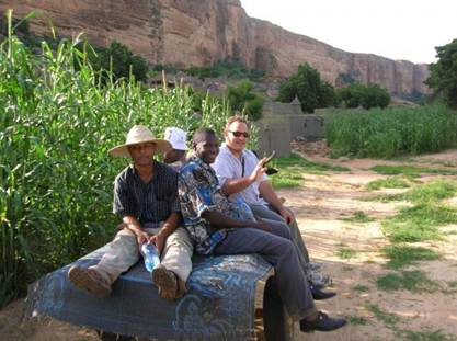 Former Country Director Mike Simsik visiting volunteer sites in Dogon country